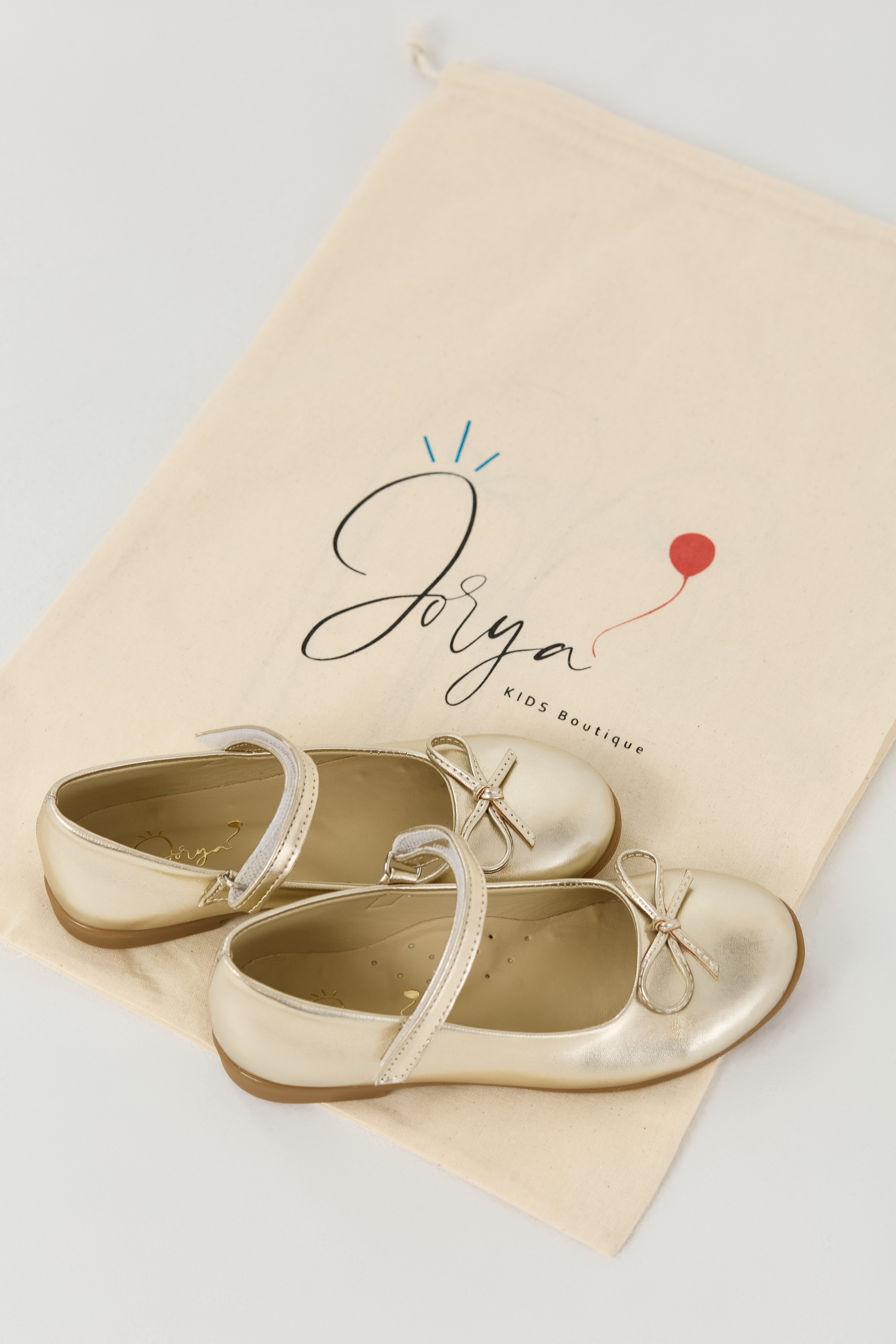 Golden Bow Ballet Flats